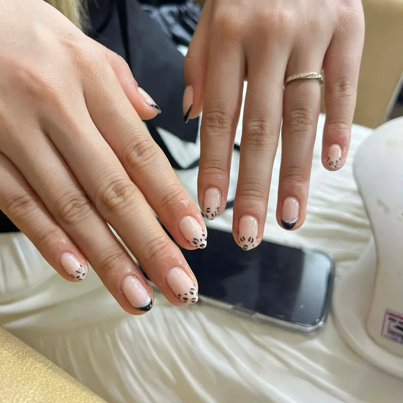 Nude nails with minimalist line art by LENA Nails & Beauty, nail salon in Da Nang