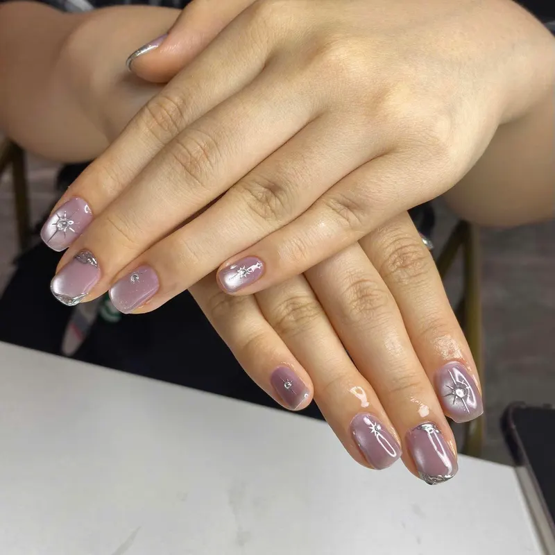 Mauve chrome marble nails by LENA Nails & Beauty, nail salon in Da Nang