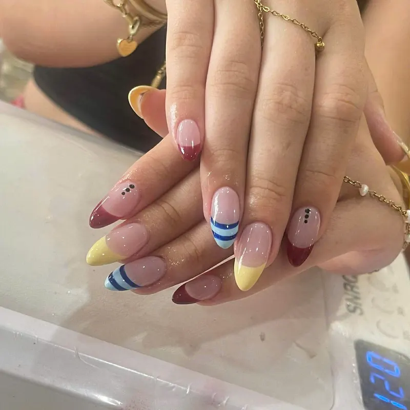 Nude nails with colourful tip art by LENA Nails & Beauty, nail salon in Da Nang