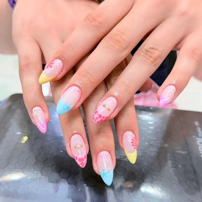 Pastel nails with floral art by LENA Nails & Beauty, nail salon in Da Nang