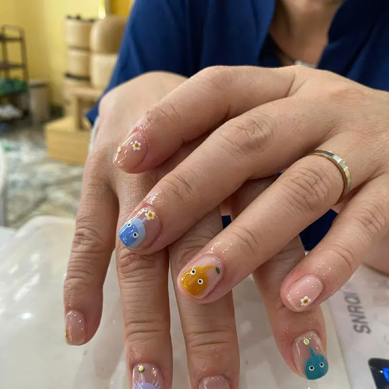 Nude nails with colourful dot art by LENA Nails & Beauty, nail salon in Da Nang