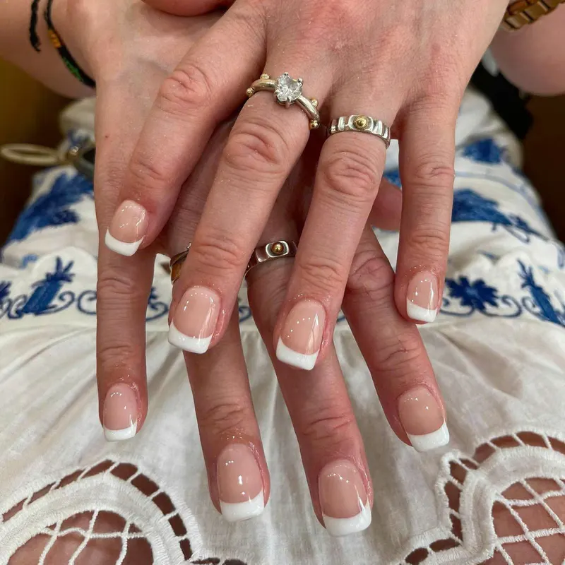Classic white French tip square nails by LENA Nails & Beauty, nail salon in Da Nang
