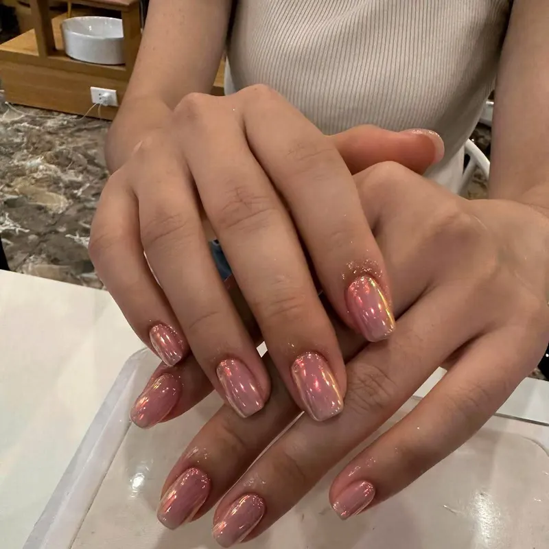 Rose chrome almond nails by LENA Nails & Beauty, nail salon in Da Nang